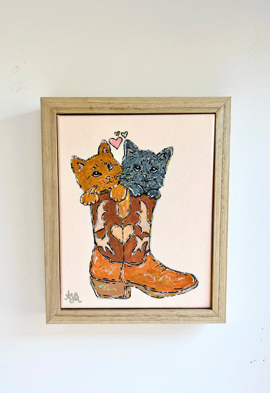 Playful Pussycats In A Boot