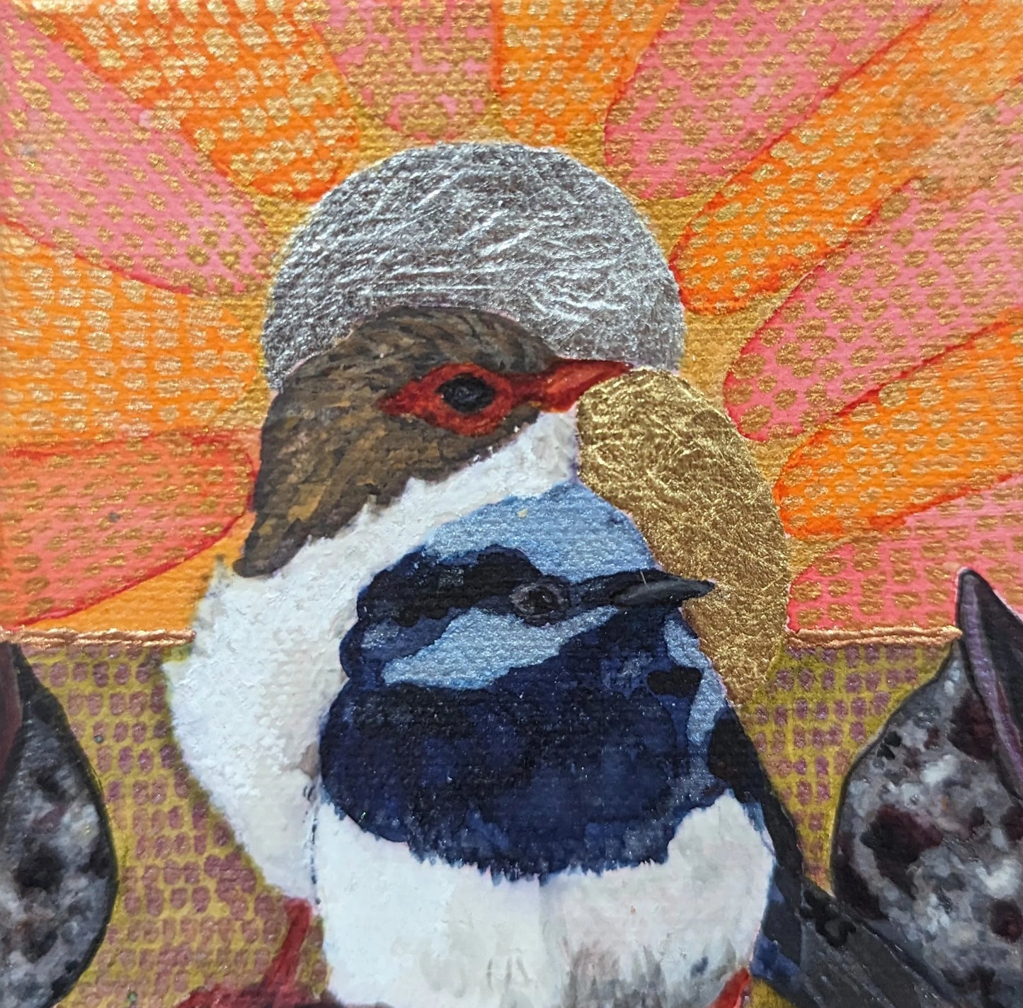 Wren couple with halos in a golden sunset