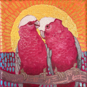 Pink couple under a gold sun
