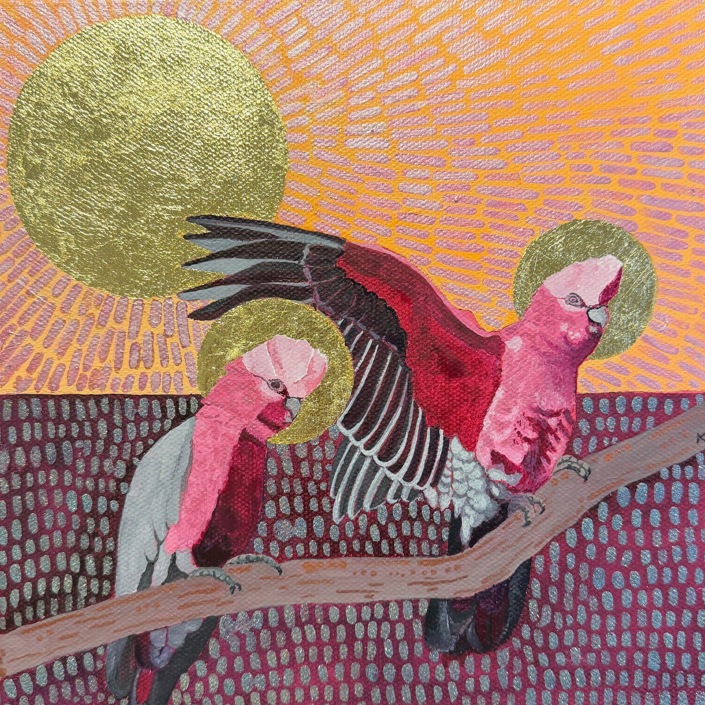 Pink girls on a branch under a golden sun